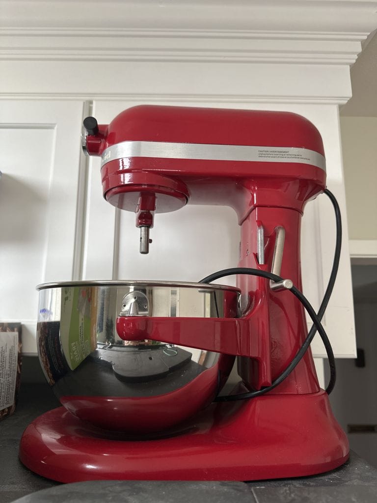 A red KitchenAid stand mixer